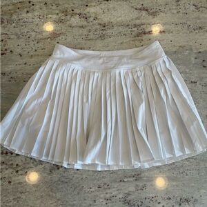 Girl’s All In Motion White Skirt. Size XL (14). GUC. Small stain on the back.